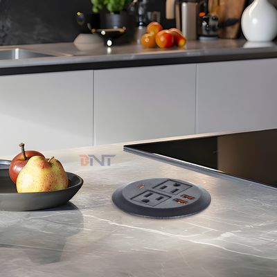 Ronde bankstel met ingebouwde elektrisch stopcontact met 2 Amerikaanse standaard stopcontacten & dubbele USB A oplaadpoort 65W